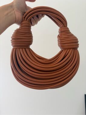 Double knotted handbag